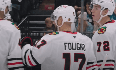 Nick Foligno #17 celebrates with his Chicago Blackhawks teammates.